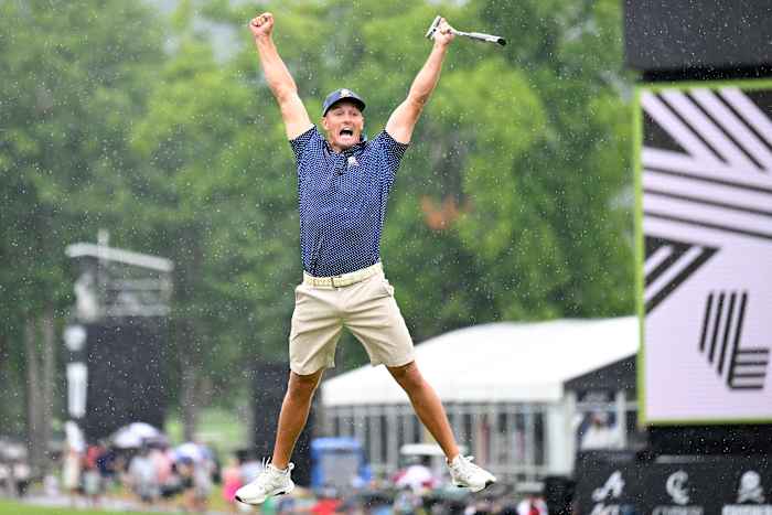 Bryson DeChambeau of the United States celebrates his birdie putt on the 18th hole with a record 58 to win the LIV Golf Invitational - Greenbrier at The Old White Course on August 06, 2023 in White Sulphur Springs, West Virginia.